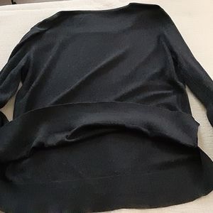 Dark gray sweater with flared sleeve